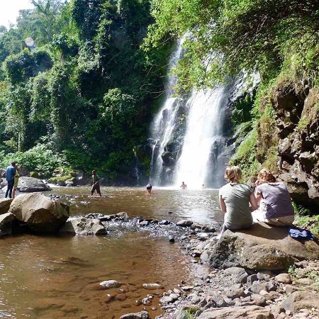 The best day trip to Marangu waterfalls, caves, and coffee tours from Moshi Tanzania